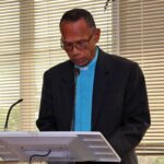 Rev. Isireli Kacimaiwai while delivering the opening prayer.